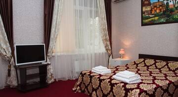 Фото номера Двухместный номер &quot;Комфорт&quot; с 1 кроватью Гостиница Baden Baden г. Волжский 2